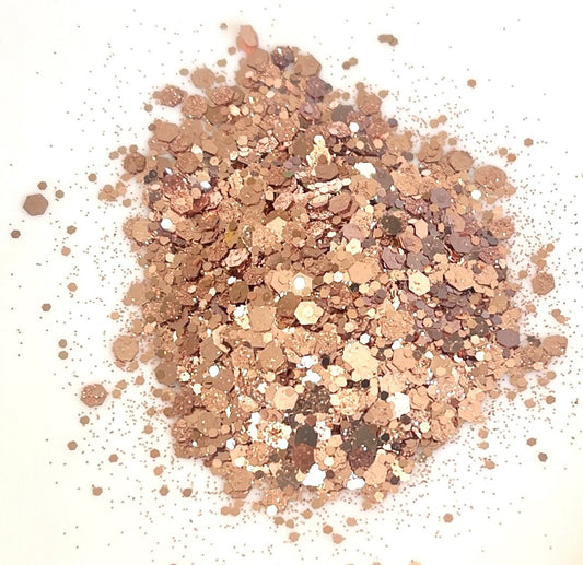 Rose gold glitter on a white background