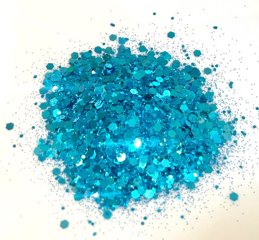 Blue glitter on a white background