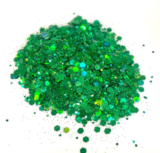 Green glitter on a white background