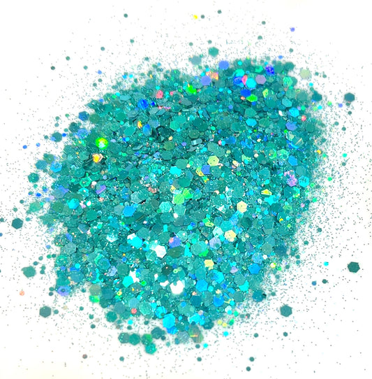 Turquoise glitter on a white background