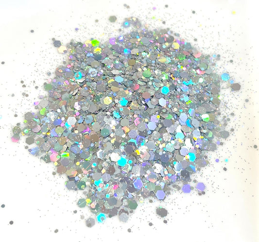 Holographic silver glitter on a white background