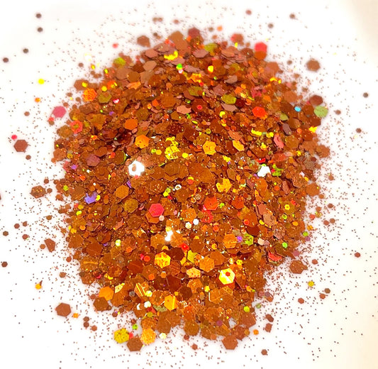 Orange glitter on a white background