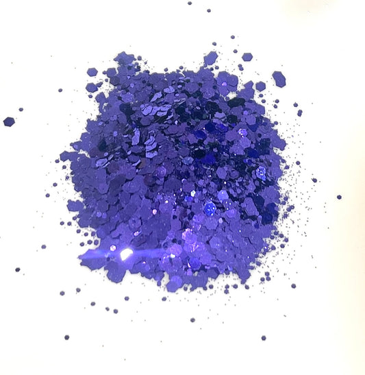 Purple glitter powder on a white background
