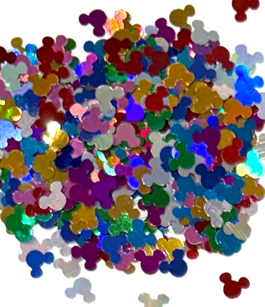 Colourful rainbow Mickey Mouse shaped glitter confetti on a white background