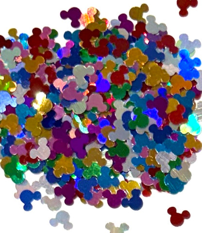 Colourful rainbow Mickey Mouse shaped glitter confetti on a white background